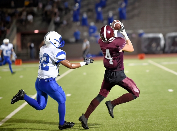 High school football athletes playing in fall game